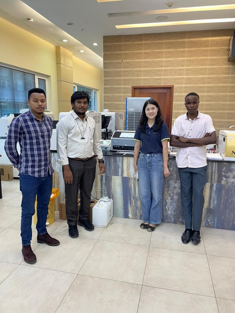 Pasha healthcare partners standing in a hospital laboratory with installed equipment